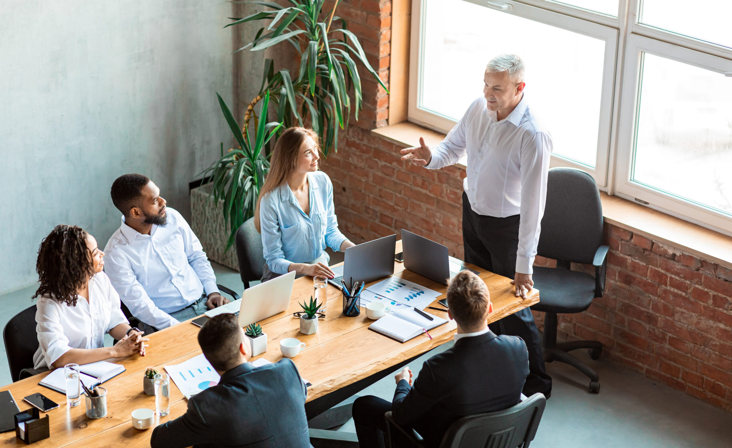 construction company leadership team discussing long-term business strategy